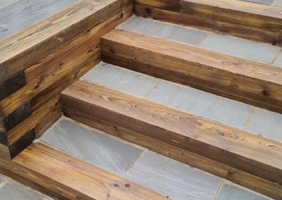 Patio Slabs and wood railroad tie steps