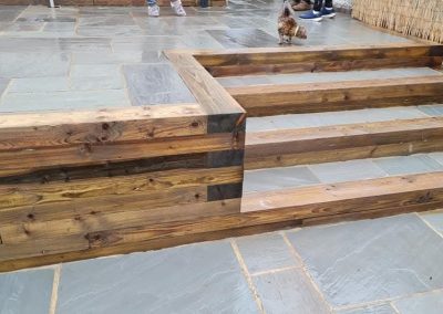 Patio Slabs and wood railroad tie steps