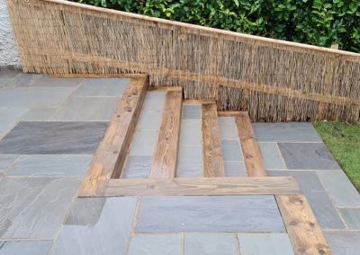 Patio Slabs and wood railroad tie steps